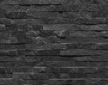 a black and white photo of a brick wall