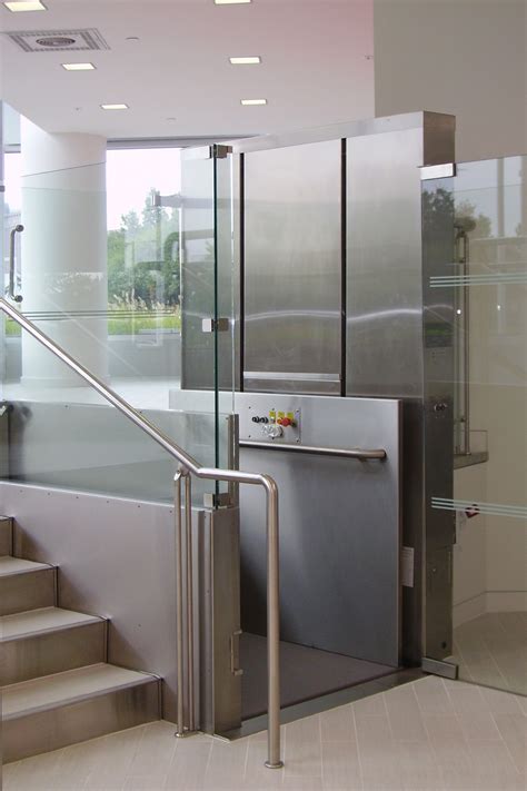 Glass Vertical Wheelchair Lift - Elevators | Nationwide Lifts