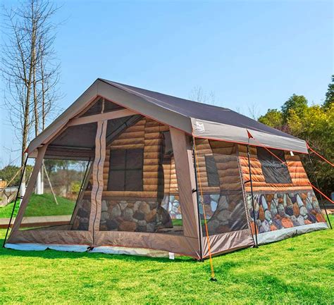 This Log Cabin Tent Has a Giant Screened In Front Porch For a True Luxury Camping Experience