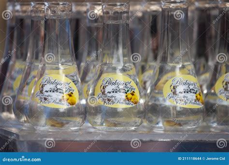 Dunjevaca Rakija on Display in Typical Serbian Rakija Glasses, Cokanji. Editorial Stock Image ...