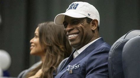 Deion Sanders smiles as he is introduced as Jackson State's head ...