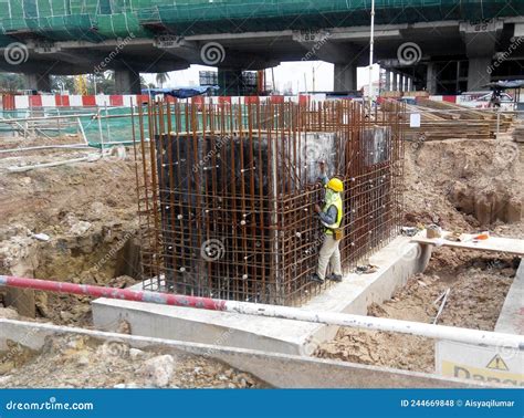 Construction Workers Install Reinforcement Bars at the Construction ...