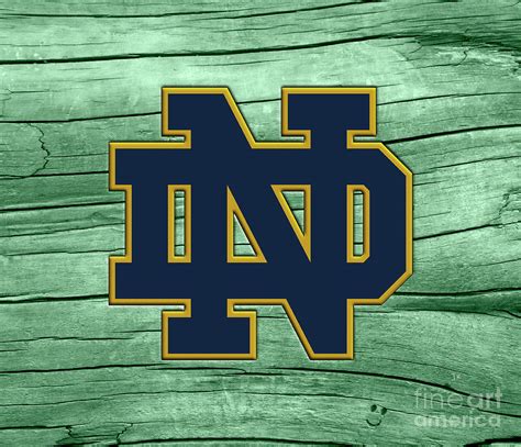 University of Notre Dame Fighting Irish Logo On Green Weathered Wood ...