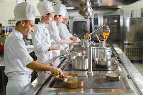 Premium Photo | Cook cooks in a restaurant.