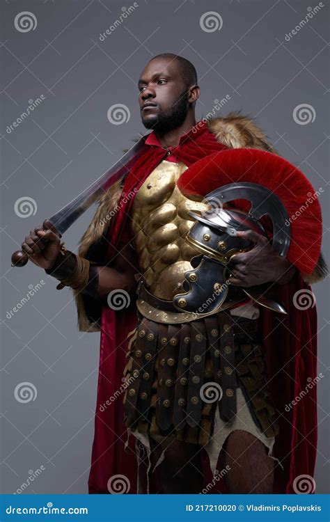 Black Roman Soldier with Sword on His Shoulder Stock Photo - Image of ...