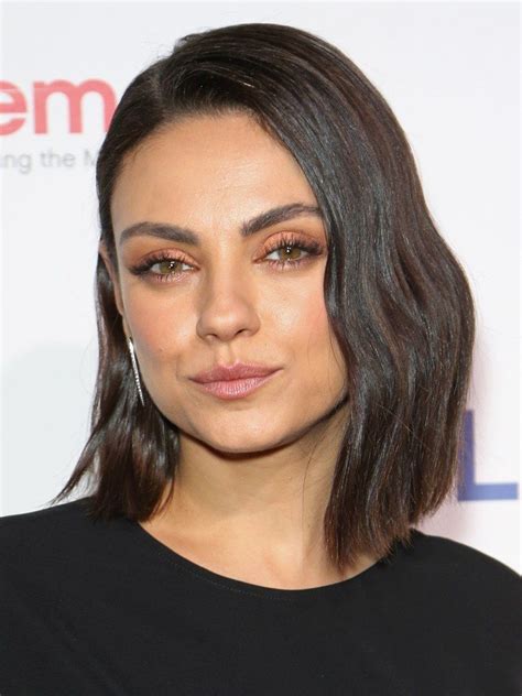 Mila Kunis Just Cut Her Hair Into a Cute Angled Bob | Wavy bob hairstyles, Haircuts for wavy ...