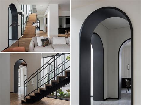 Matte Black Lined Archways Complement Other Black Accents Throughout This Interior