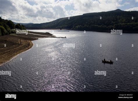 fishing on ladybower reservoir derbyshire england uk gb Stock Photo - Alamy