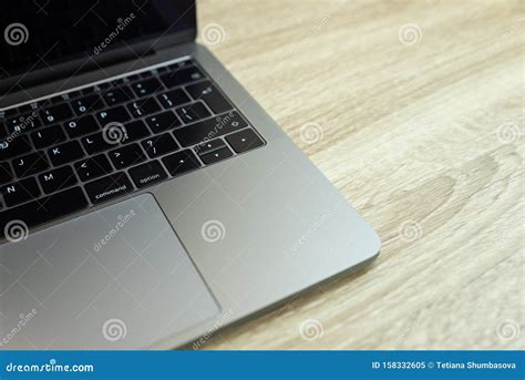 Metallic Laptop on Wooden Table. Top View Stock Image - Image of ...