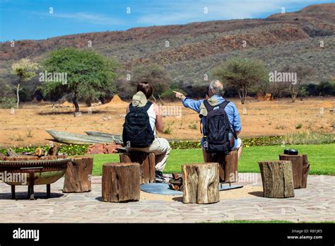 Guests viewing wildlife at Okonjima Bush Camp, Okonjima Nature Reserve, Namibia, Africa Stock ...