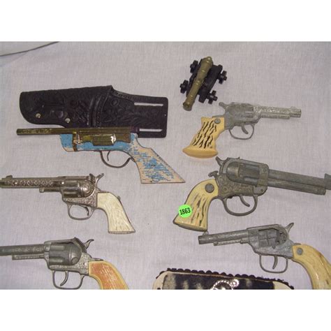 group of vintage toy cap guns