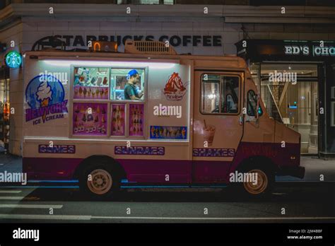 A pink ice cream truck outside of a building in New York City Stock Photo - Alamy