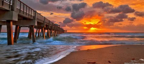 Dramatic Sunrise over Juno Beach Fishing Pier Panoramic | Justin Kelefas Fine Art Photography