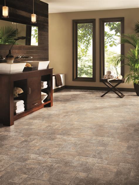 Vinyl Sheet Flooring from Empire Today® allows you to get a real stone or wood look an aff ...