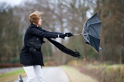 Windy Umbrella Stock Photos, Pictures & Royalty-Free Images - iStock