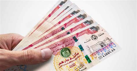 Damaging UAE currency notes carries hefty fines - Dubai Eye 103.8 ...