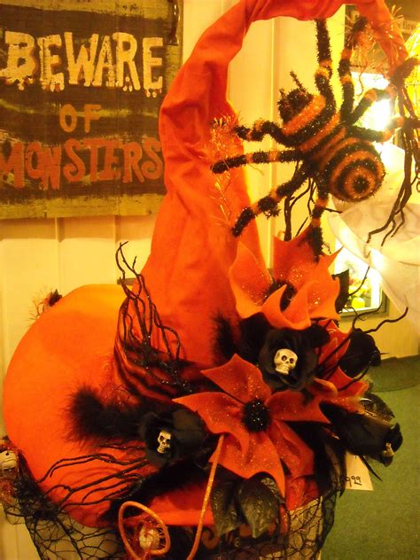 a basket filled with halloween decorations on top of a table