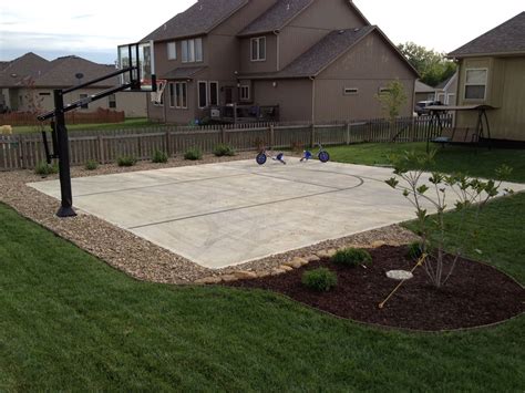 His Pro Dunk Gold Basketball System sits nicely beside the concrete court. (With images ...