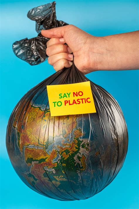 Close Up Photo of a Woman removing a Plastic Bag stuck in a Boat Propeller with a Knife and her ...