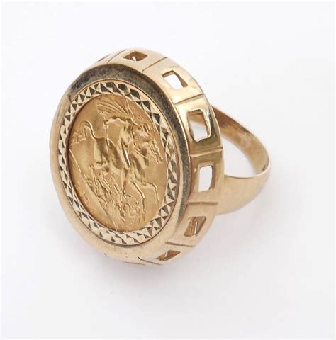 George V gold sovereign, 1914, mounted in 9ct gold ring. at Whyte's Auctions | Whyte's - Irish ...