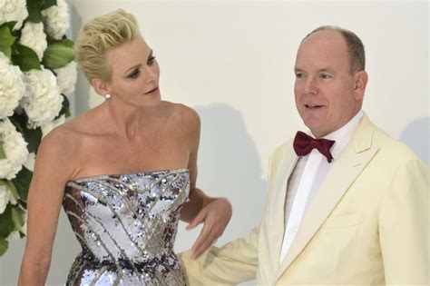 Prince Albert II of Monaco with his wife Princess Charlene pose as they arrive at the 69th ...