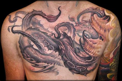 Colorful great giant squid tattoo on chest - Tattooimages.biz