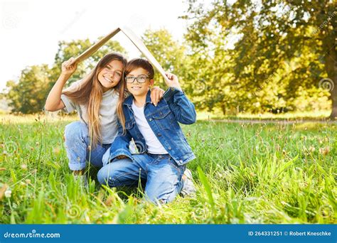 Brother and Sister with a Roof Over Their Heads Stock Image - Image of protection, idea: 264331251