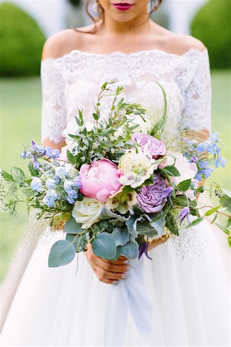 love the soft blue, purple and pink in this bridal bouquet. it's romantic and just so pretty ...