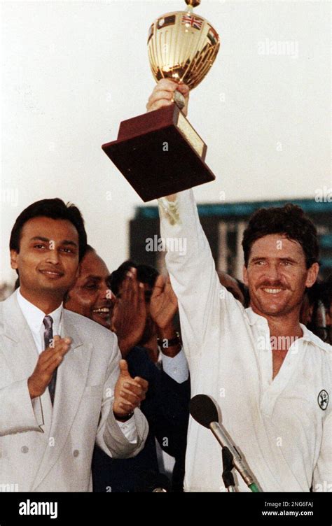 Australian captain Allan Border raises the World Cup after his team beat England by 7 runs in ...