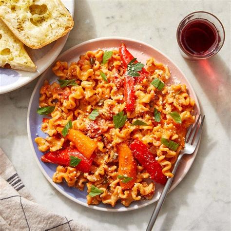 Recipe: Mafalda Pasta in Creamy Tomato Sauce with Cheesy Bread - Blue Apron