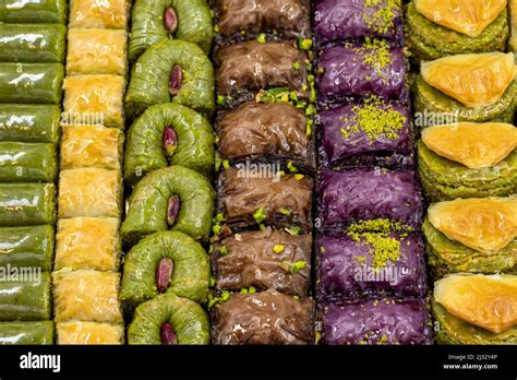 Pistachio baklava. Varieties of baklava with pistachio in a tray. Traditional Turkish cuisine ...