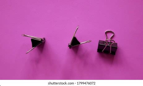 Black Binder Clip On Pink Background Stock Photo 1799476072 | Shutterstock