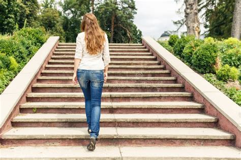 Rear View of Young Woman Going Up Stairs in Park Stock Photo - Image of scene, park: 89435238