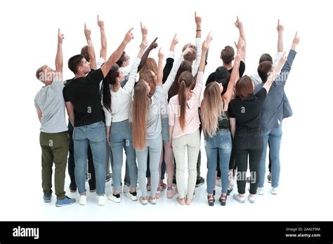 large team of young people pointing somewhere up Stock Photo - Alamy