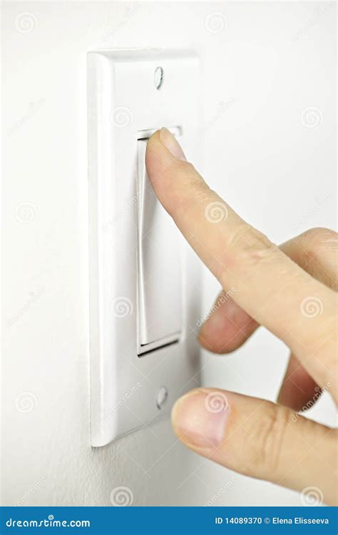 Turning off light switch stock photo. Image of saving - 14089370