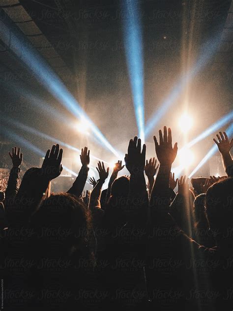 "Hands Raised At Live Concert" by Stocksy Contributor "Branden Harvey ...