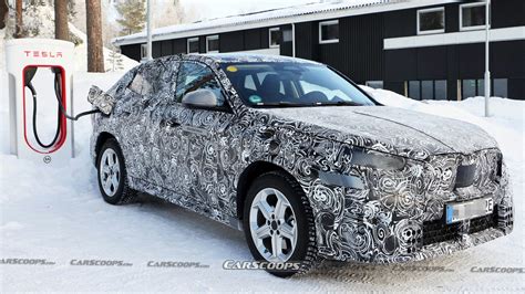 2024 BMW iX2 Spied Getting An Electric Assist From Tesla | Carscoops