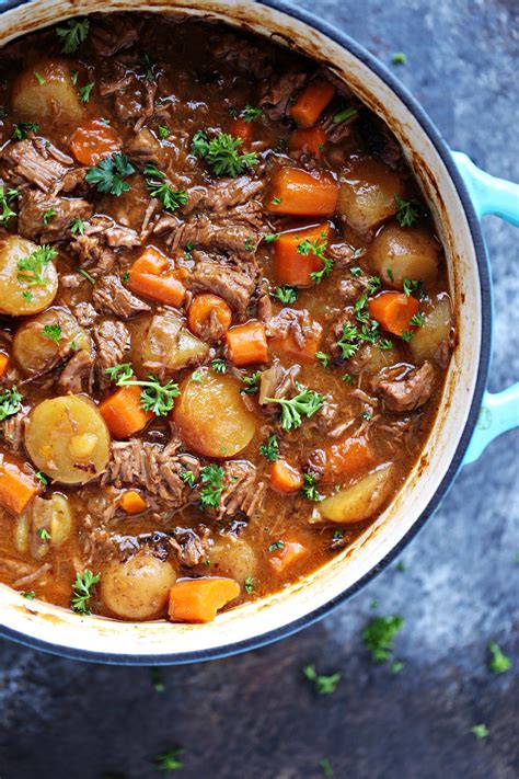 This Guinness Beef Stew recipe is made on the stovetop in a Dutch oven and packed with flav ...