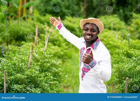 African Farmer Man Standing in the Organic Farm with Wearing Native ...