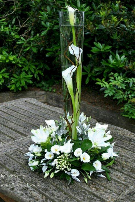 White Winter Flower Arrangements 6 | White flower arrangements, Flower arrangements, Winter ...