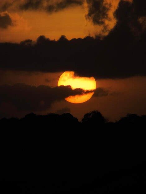 Premium Photo | Beautiful and romantic sunset dramatic clouds at sunset on pipa beach brazil