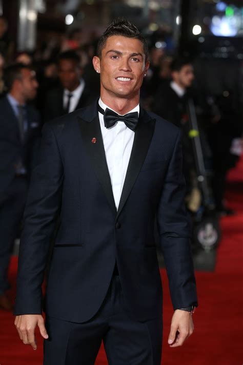 Cristiano Ronaldo proudly shows off his son at documentary premiere