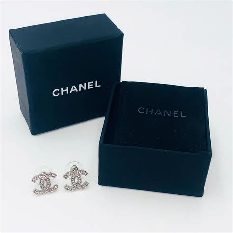 Vintage Pair of Authentic Chanel Earrings Silver set with Rhinestones - Artedeco - Online Antiques