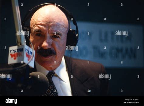 Watergate Co-conspirator G. Gordon Liddy on his talk radio show Stock Photo - Alamy