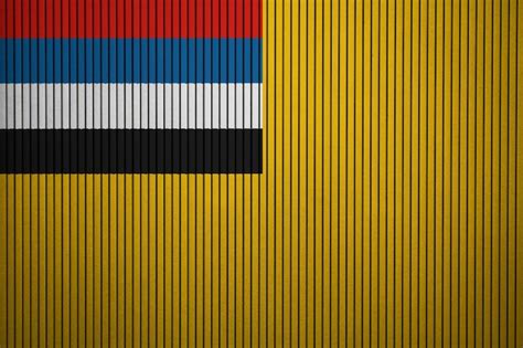 Premium Photo | Painted national flag of manchukuo on a concrete wall