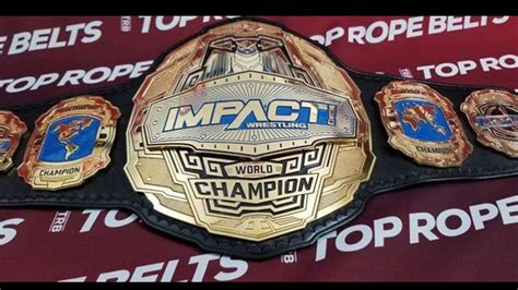 New UFC championship belt takes a lot of inspiration from recent WWE title belt design... : r ...