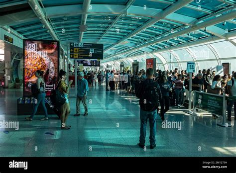 The Santos Dumont airport departure room passenger terminal crowded with passengers waiting for ...