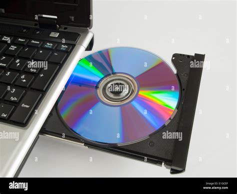 A rewritable CD ROM in the CD drive of a labtop computer Stock Photo - Alamy