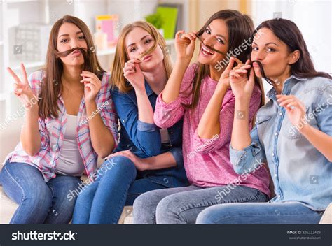 Group Girls Friends Sitting On Couch Stock Photo 326222429 | Shutterstock