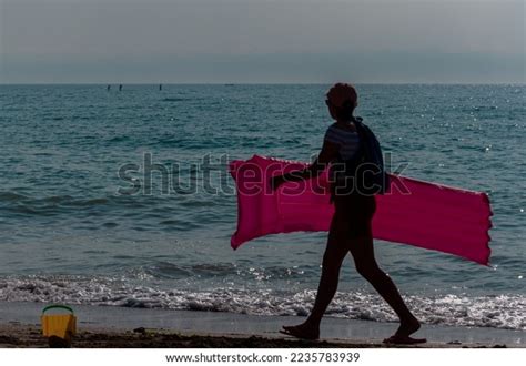 Silhouette People Walking On Beach Unrecognisable Stock Photo ...